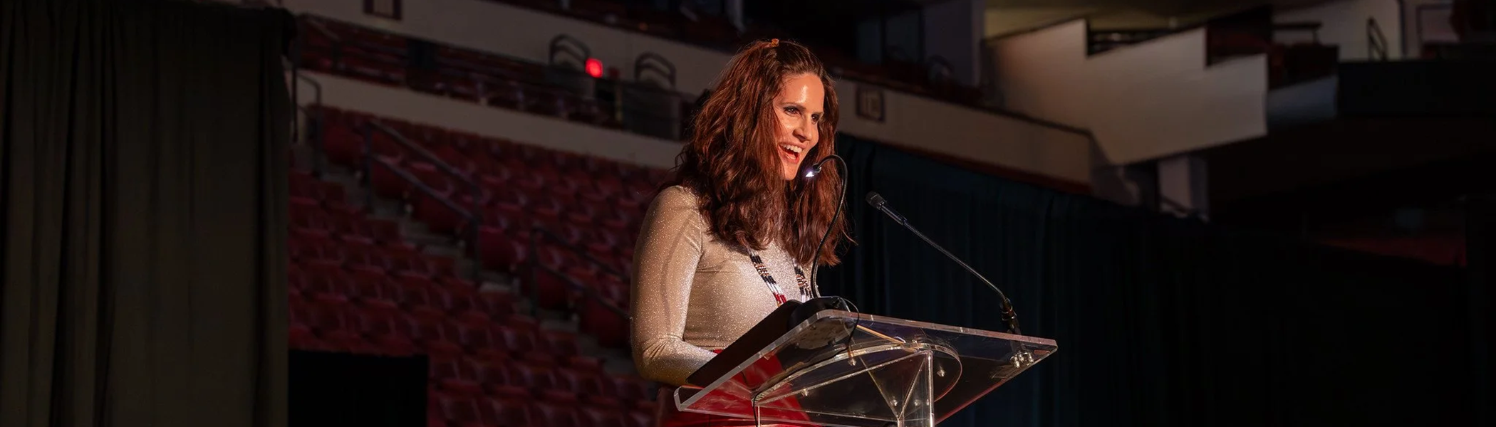 Vice President Marla Vickers speaking at a Seminole 100 Awards ceremony