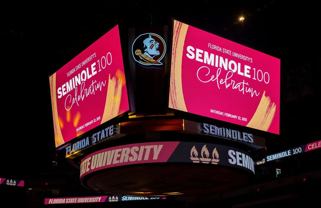 A photo of digital banners advertising the Seminole 100 celebration
